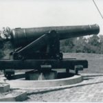 CCC enrollees retrieved a 32 pound artillery piece from the river.