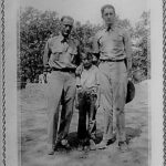 Unidentified military officers and child